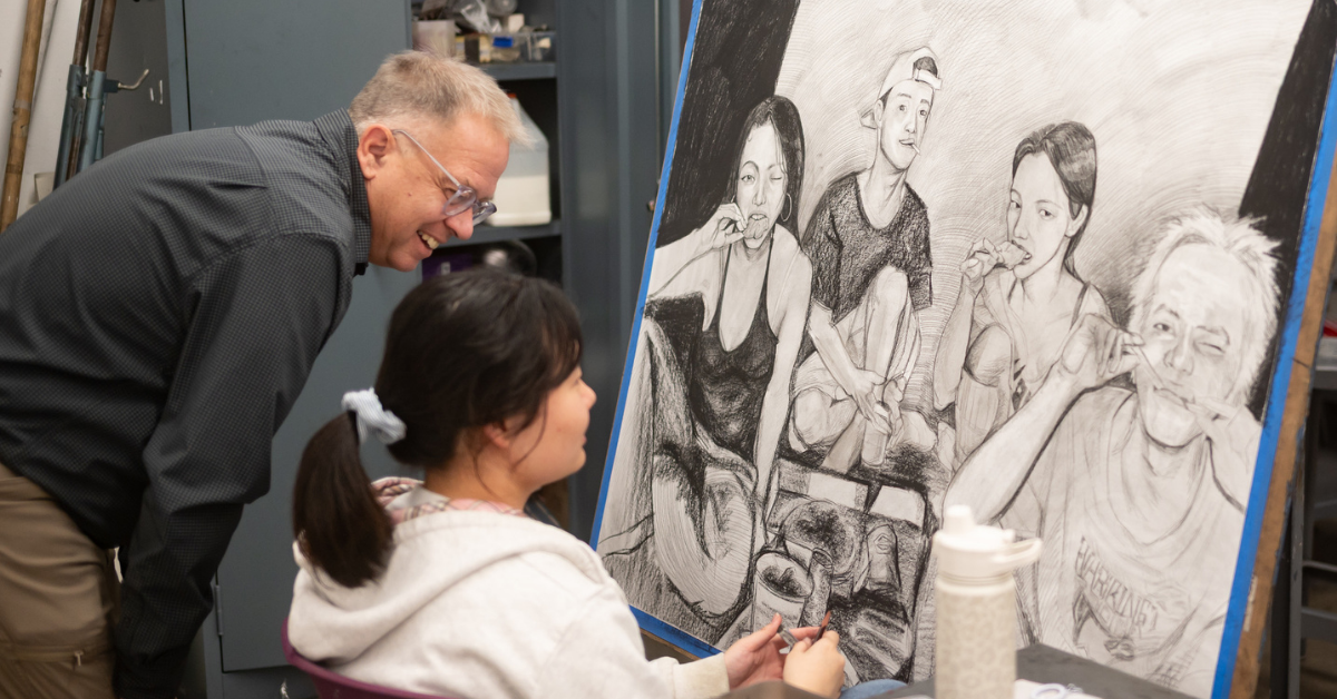 professor working with student