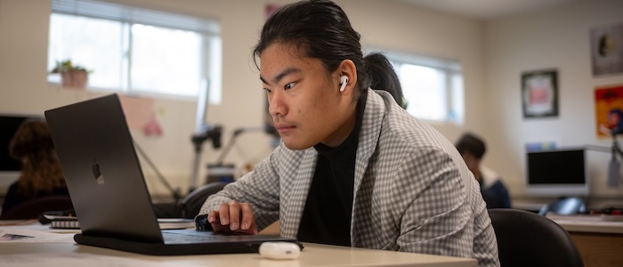 man using laptop